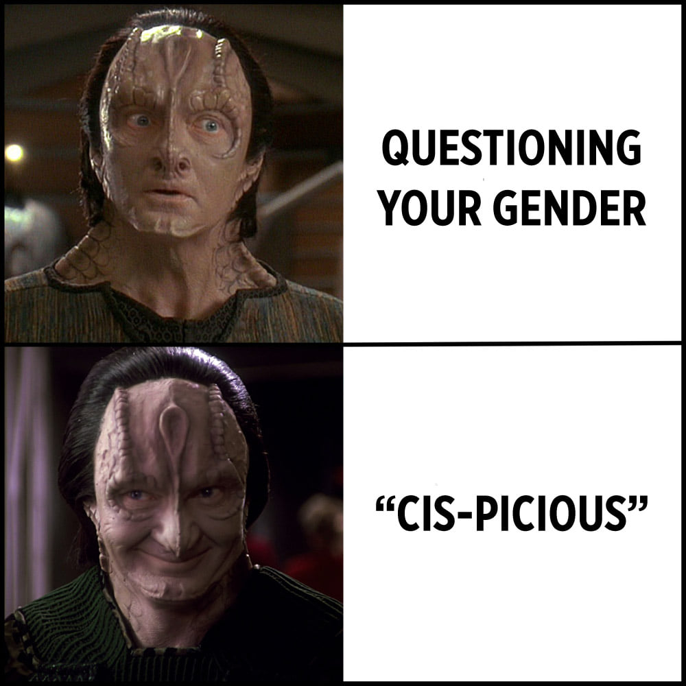 The meme features a split-screen image of the character K'Ela from the Star Trek: The Next Generation episode "The Child," with a puzzled expression on her face. The left side of the image shows her looking confused, while the right side shows her with a more confident and assertive expression. The text "I'm not arguing, I'm just explaining why I'm right" appears above the split-screen image, but the meme itself is actually a joke about a character's response to being asked to identify as something other than their assigned gender at birth.